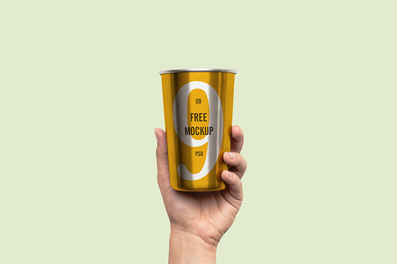 Download Free Mockup Of A Hand Holding Metal Cup Creatives Feed